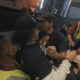 Di tengah penampilan energik, vokalis Burgerkill, Vicky Mono